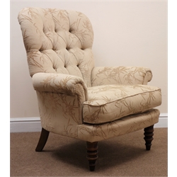  Victorian style salon armchair, upholstered in deep buttoned beige fabric, scrolled arms, turned supports, W83cm  