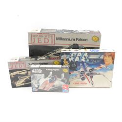 Four Star Wars model kits, comprising AMT ERTL A-Wing Fighter, in sealed packaging, MPC ERTL Return Of The Jedi Millennium Falcon, MPC ERTL Return Of The Jedi X-Wing Fighter and Denys Fisher Luke Skywalker's X-Wing Fighter, all boxed 