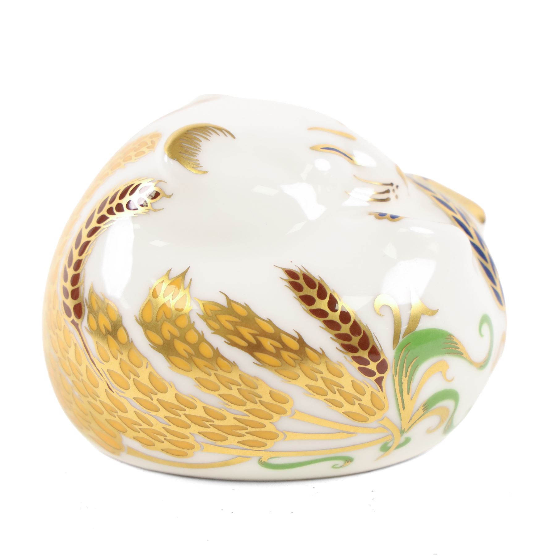 Two Royal Crown Derby paperweights comprising Imari Polar Bear with gold stopper and Sleeping Dormouse, with gold stopper  
