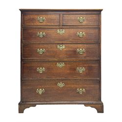 George III oak chest of drawers fitted with two short over four long drawers fitted with swan neck handles, supported on bracket feet