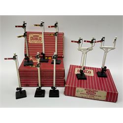 Hornby Dublo - twelve manually operated semaphore signals comprising one 5050 Signals Single Arm (D1) 2 Home, one 5060 Junction Signals (D3) 2 Home; D3 Junction Signal Upper Quadrant (1 Home 1 Distant); two 5055 Signals Double Arm (D2) 1 Home 1 Distant; two D2 Signals Double Arm (Upper Quadrant); three D2 Signals Double Arm Upper Quadrant Home - Distant; and two D1 Signals Single Arm Upper Quadrant; all boxed (12)