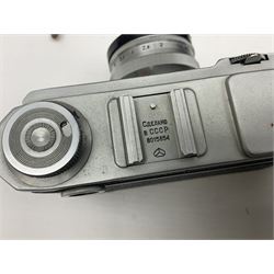 Collection of cameras and lenses, to include Pentax Program A camera body, serial no 123759, with 'Pentax-A zoom 1:3.5-4.5 28-80mm' len, Praktica EE2 camera body with 'Pentacon electric 1.8/50' lens etc, together with a Manfrotto tripod 