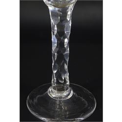 Late 18th century drinking glass, the trumpet bowl engraved with the initials 'TM MJ' and two hands clasped together in a handshake, upon a diamond faceted stem and conical foot, H17cm