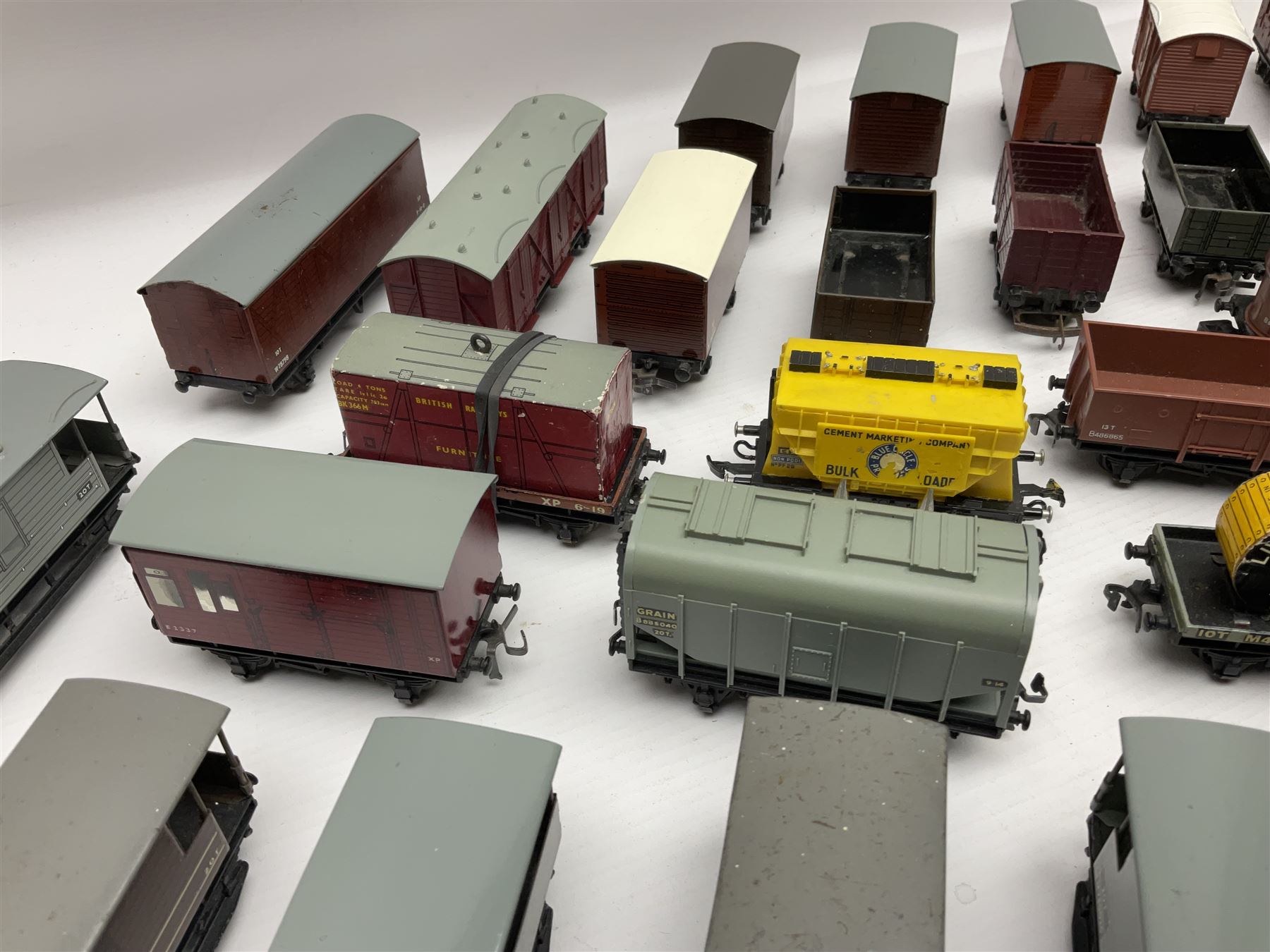 Hornby Dublo - forty-three goods wagons including nine tank wagons (Esso, Mobil, Vacuum, UD and Traffic Services), brake vans, meat and fish wagons, bogie well and bolsters, cable drums, open wagons, salt and grain wagons, etc; and six others by Tri-ang etc; all unboxed (49)