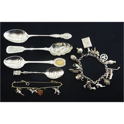 Silver charm bracelet, charms including Jemima puddle-duck, toadstool, owl, hedgehog and horse and carriage, William IV silver berry teaspoon by John, Henry & Charles Lias, London 1831, three other silver spoons and a nickel bracelet with silver charms