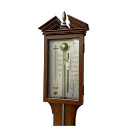 20th century - mercury cistern barometer in an 18th century style mahogany case with contrasting inlay and a broken pediment, round base with a turned cistern cover, fully exposed glass tube and silvered register within a glazed door, with a Fahrenheit spirit thermometer, engraved weather predictions and sliding vernier. Mercury clean and present.

