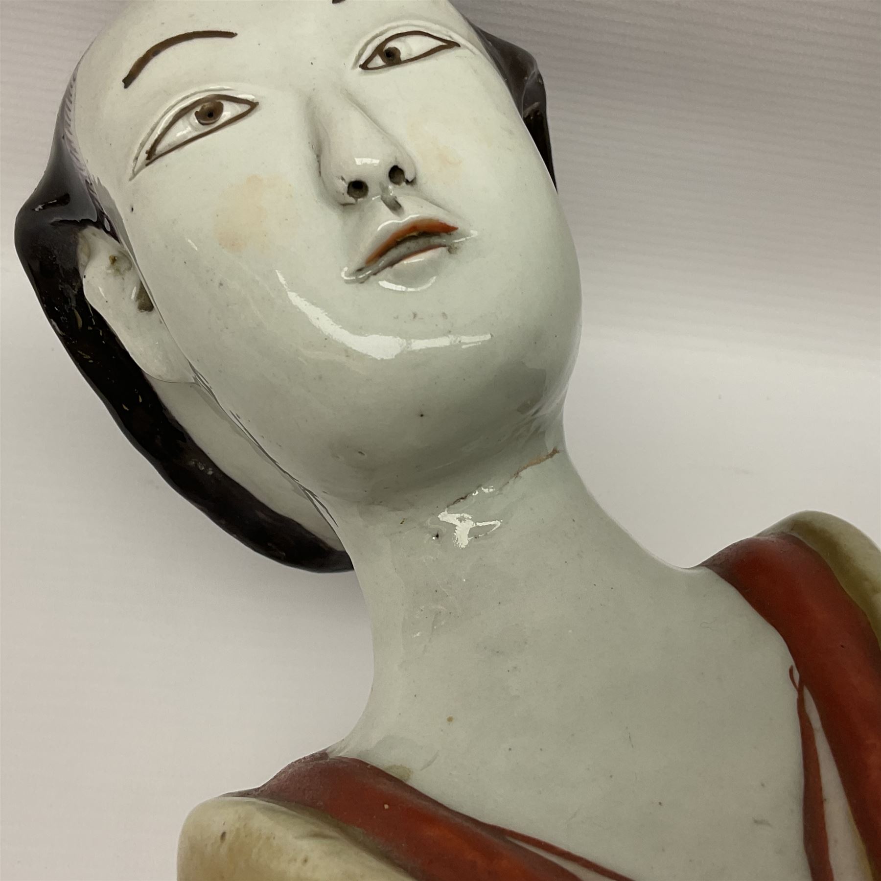 Large Japanese Imari porcelain figure, modelled as a Bijin, wearing a long kimono decorated with apple blossom and leafy branches on a white ground, with gilt detailing, possibly Edo period, H63cm