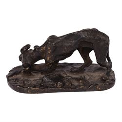 After R J Mene, bronze modelled as a dog with a bone, H5cm, L10cm 