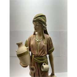 Royal Dux figure no. 686, modelled as a female water carrier, carrying two urns and wearing flowing green and pink robes, with applied pink triangle mark beneath, H61cm
