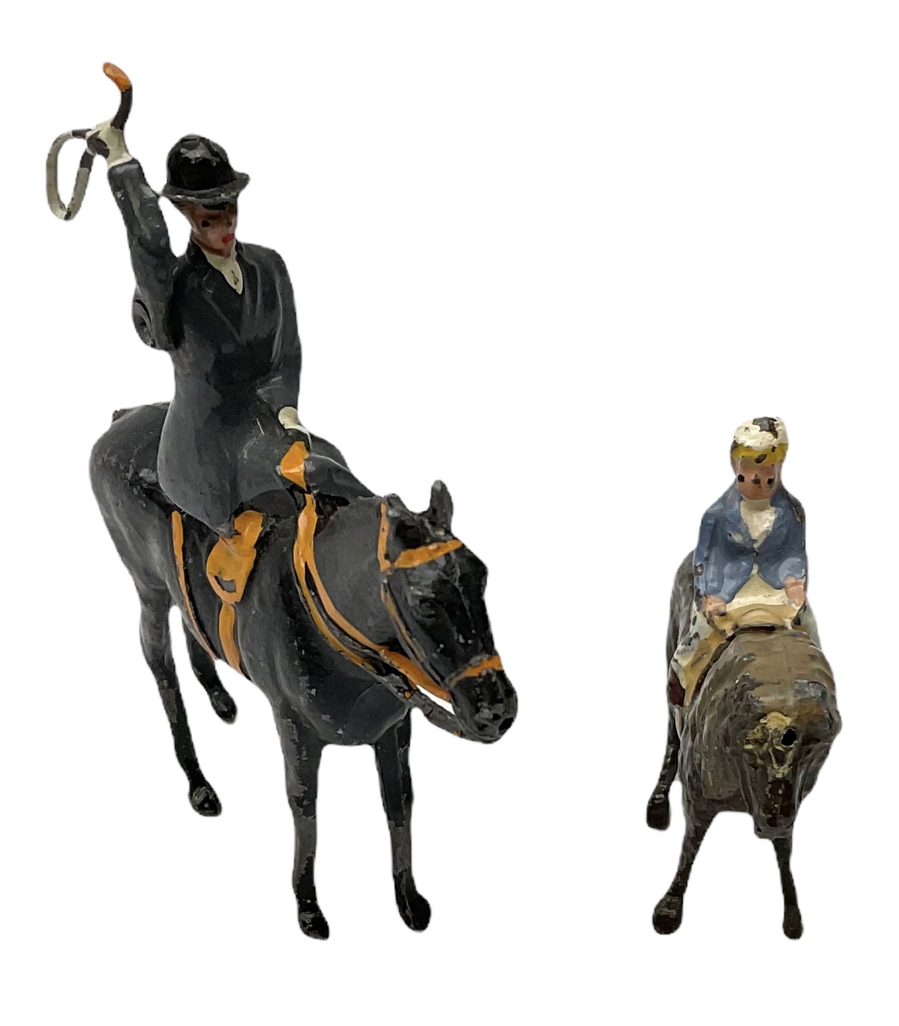 Lead figures by F.G. Taylor, Britains, Johilco, Crescent, Stoddart etc comprising twenty-six horses including three with riders and seven donkeys/ponies; various scales (33)