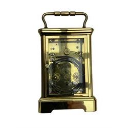 8-day French 20th century corniche carriage clock with a striking movement and repeat work, white enamel dial with Roman numerals, minute track and steel moon hands, dial inscribed St James, London. With a jewelled lever escapement, striking the hours and half hours on a coiled gong. 
