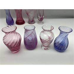 Collection of pink/purple Caithness glass vases, to include mottled and swirl designs, largest 20cm (19)