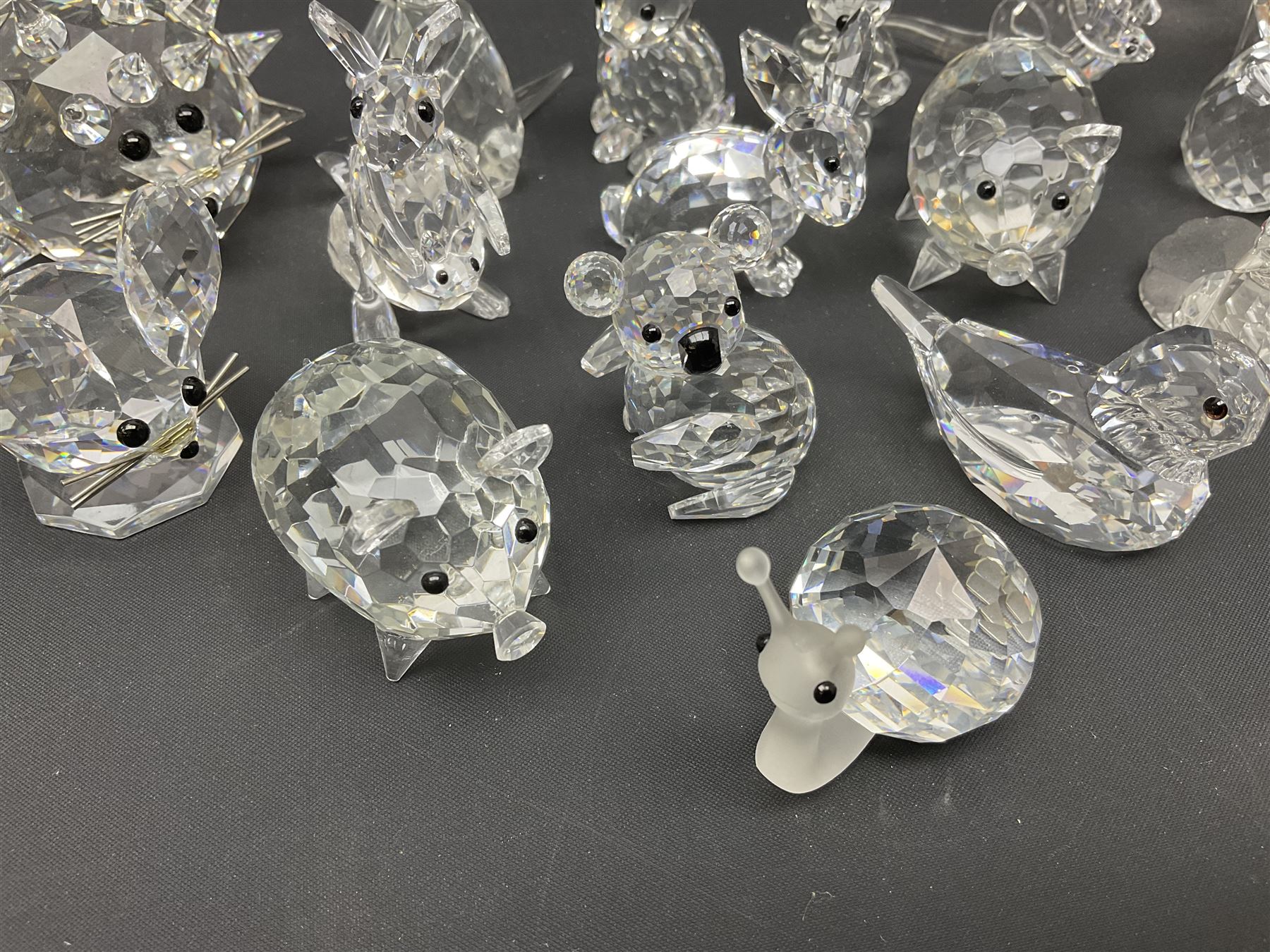 Collection of Swarovski Crystal animals, to include hedgehogs, snails, birds, mice and snakes, etc