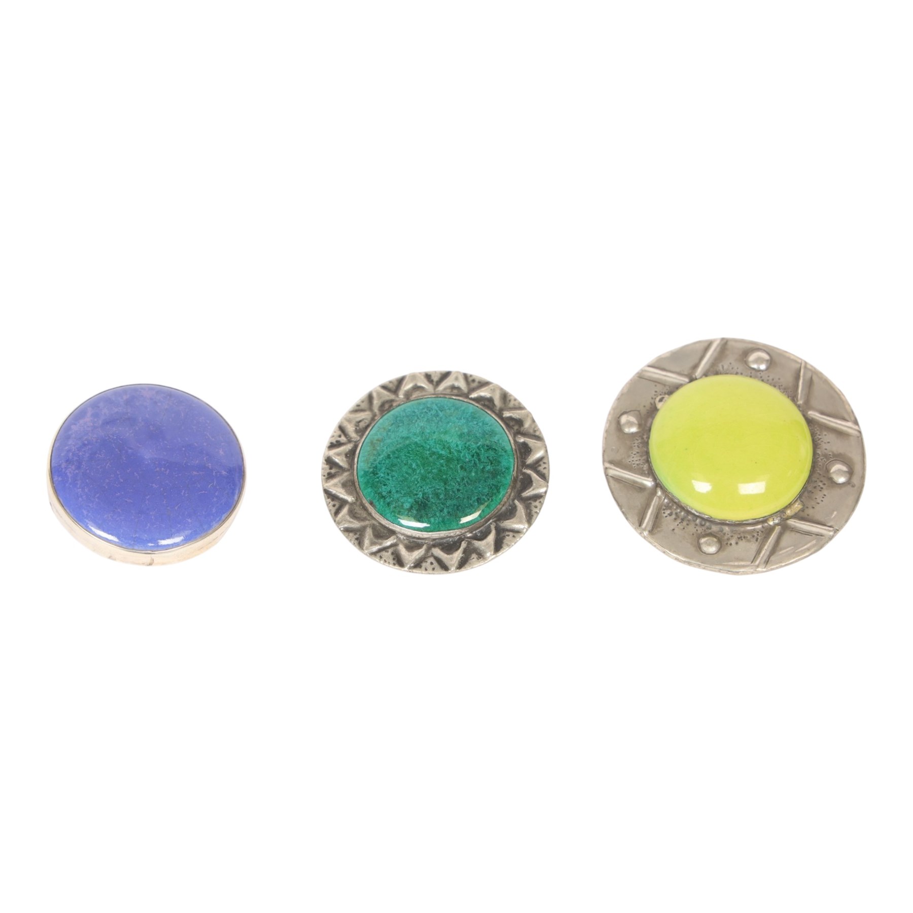 Six brooches, including one Ruskin example in silver mount, four Ruskin style brooches with ceramic roundels and a plated agate example