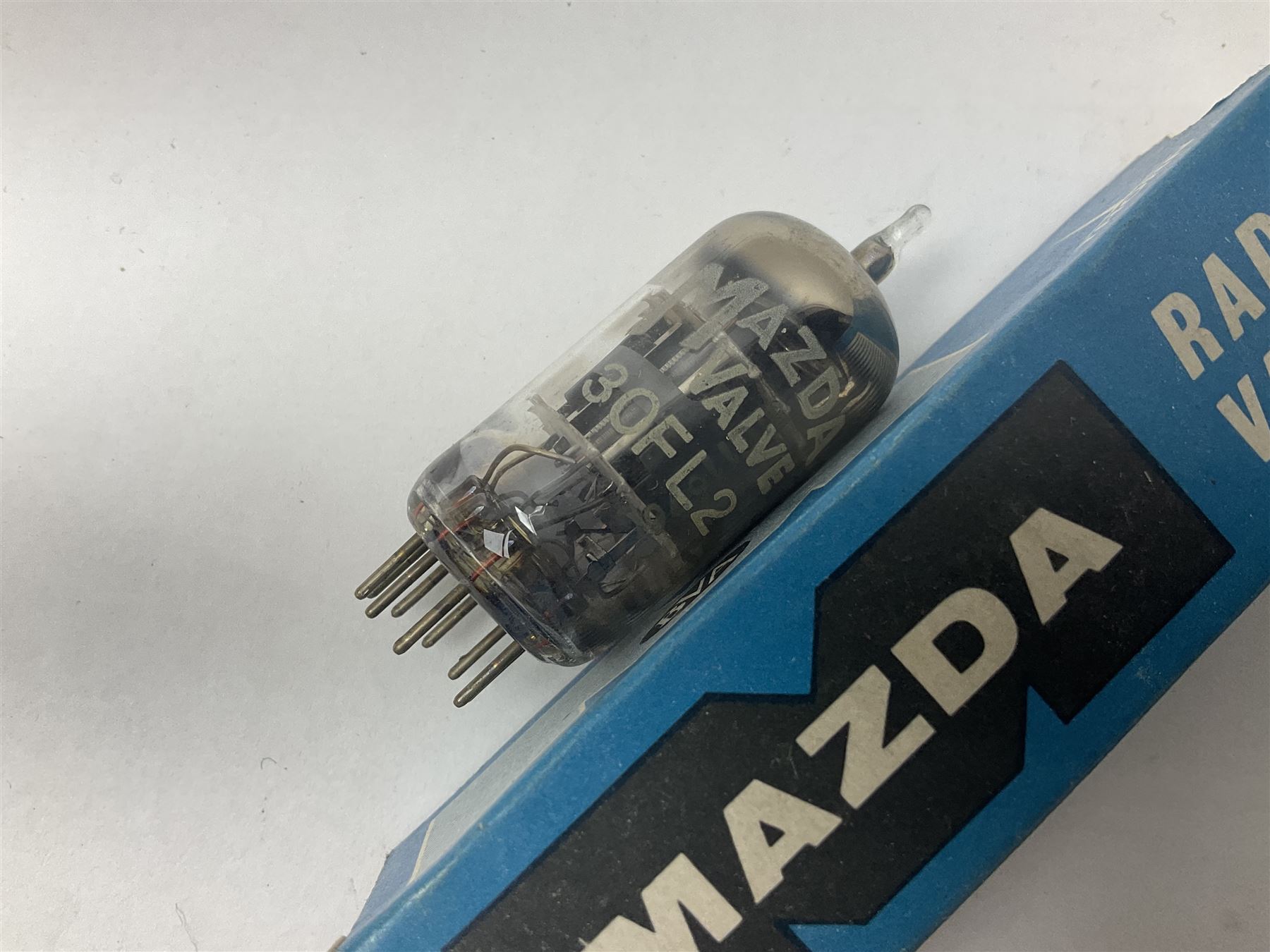 Collection of Mazda thermionic radio valves/vacuum tubes, including EH90, U26, PCF84, U26 approximately 55