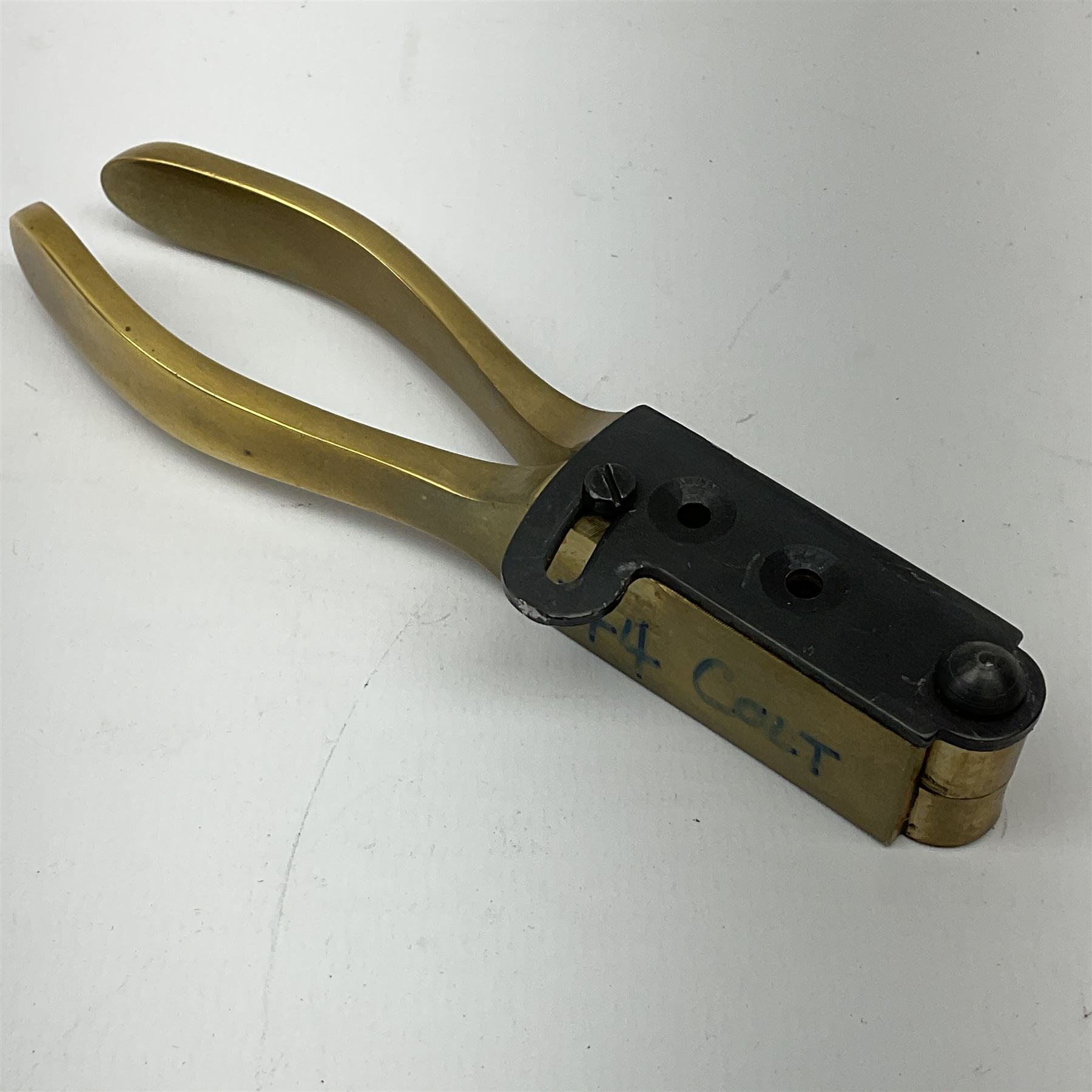 Colt model 1860 .44 calibre six-shot percussion army revolver with stepped cylinder, the 20.5cm barrel inscribed 'Address Col Saml Colt New York US America' with under barrel rammer, all parts with matching serial no.77902, traces of plating to brass trigger guard, two-piece walnut grips L37cm; with modern brass bullet maker and leather holster