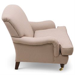Laura Ashely - Howard design hardwood-framed armchair, upholstered in checkered fabric, on turned front feet with brass cups and castors 