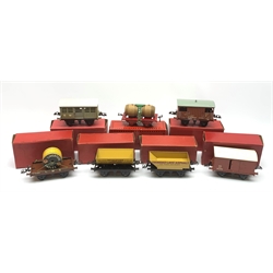 Hornby '0' gauge - six goods wagons comprising No.1 Side Tipping Wagn, Goods Brake Van, Flat Truck with Cable Drum, No.1 Rotary Tipping Wagon, No.1 Cattle Truck and No.1 Goods Van; together with French Serie Hornby Flat Truck with Barrels, all boxed (7)