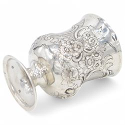 George III silver cup of circular form, embossed with scrolling and floral decoration, upon circular foot, hallmarked John Denzilow, London 1784, H13cm
