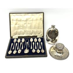 George V silver capstan inkwell with riveted style decoration, by William Aitken, Birmingham 1913, D14cm, 19th century G & J. W. Hawksley silver-plated hipflask, together with a cased set of twelve late 19th/ early 20th century teaspoons, sugar nips and spoon with bright cut decoration