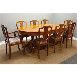  Hardwood rounded rectangular dining table on twin pedestal base with splayed supports (210cm x 120cm, H77cm), and set eight (6+2) dining chairs with upholstered drop in seat in checkered fabric  