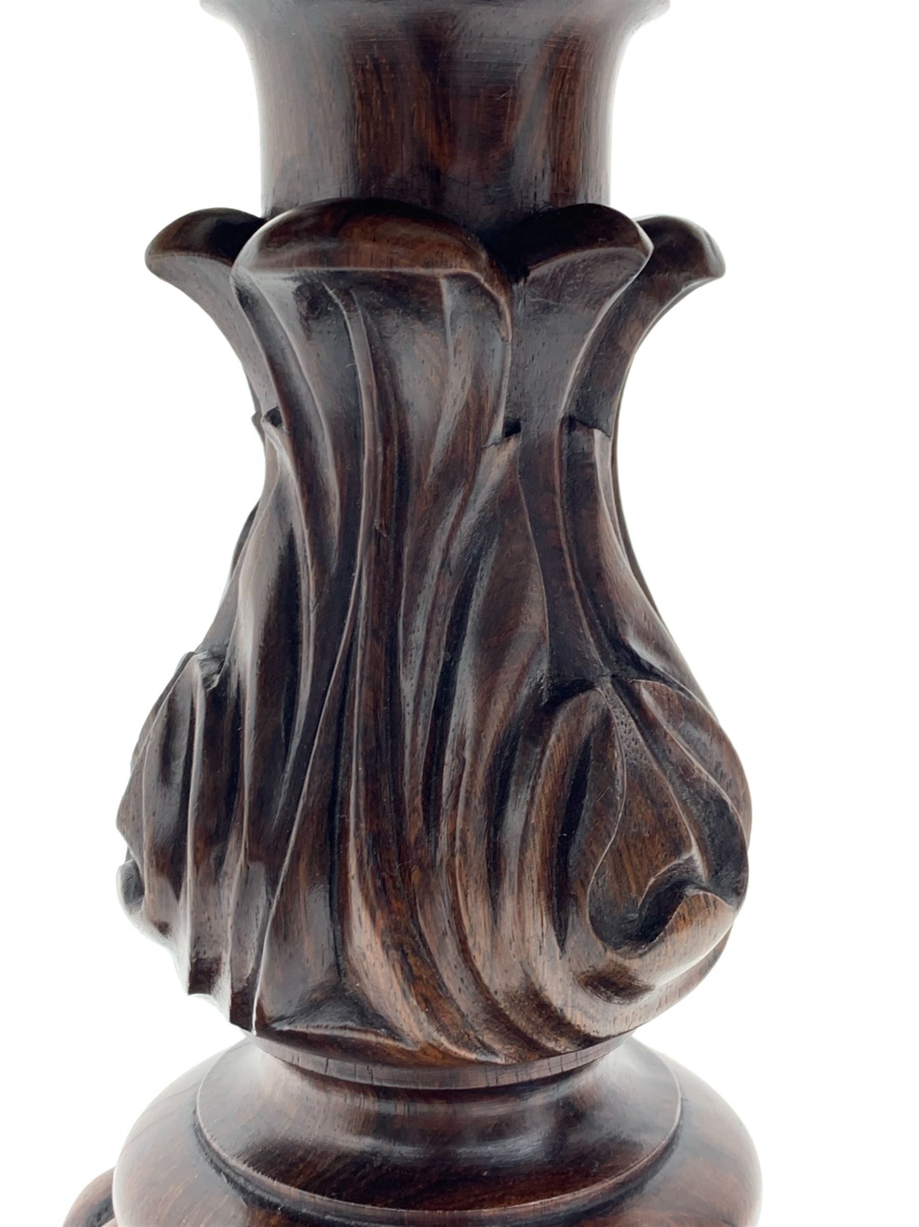 Victorian rosewood rise and fall piano stool, the floral needlework upholstered seat raised on floral and scroll carved tripod base