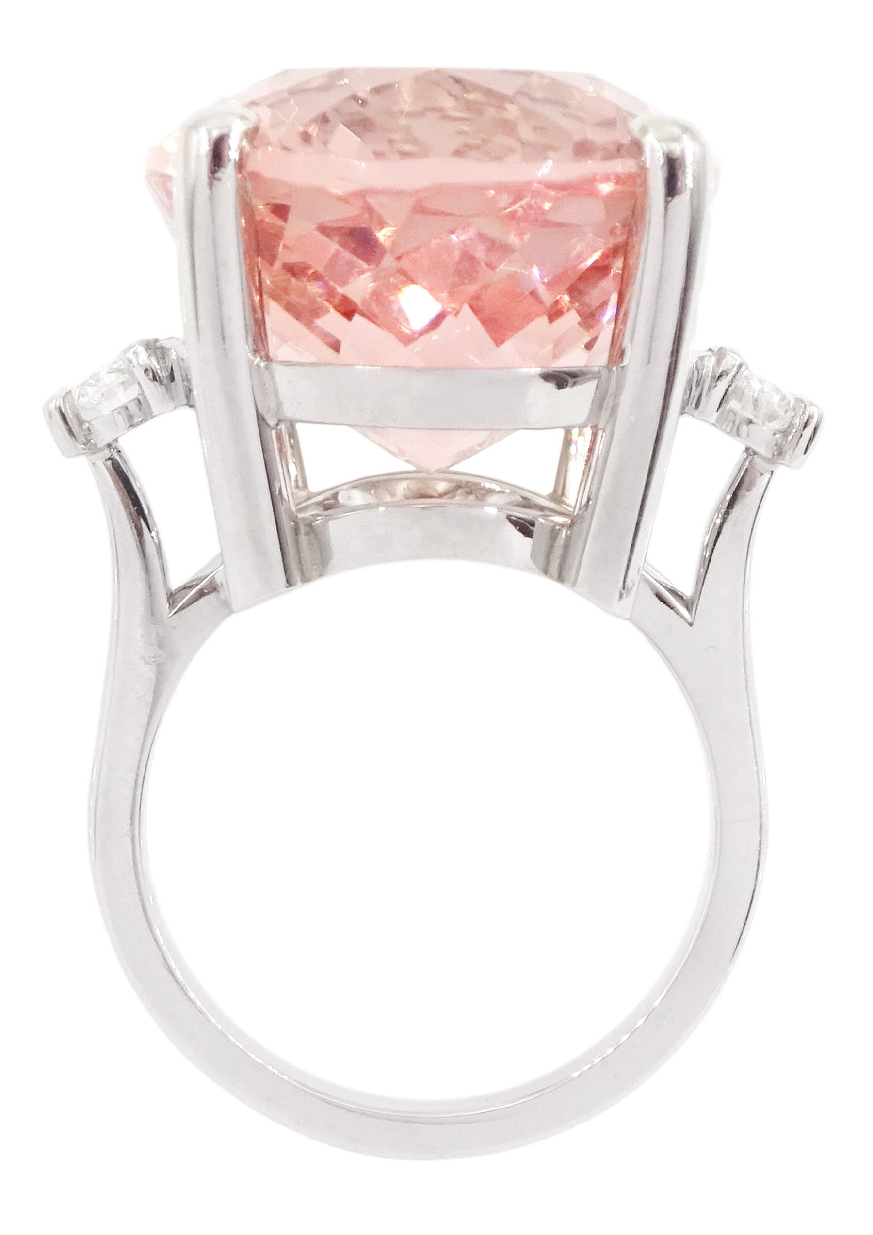 Platinum three stone large oval cut morganite and oval cut diamond ring, hallmarked, morganite 33.80 carat, total diamond weight 0.60 carat, with World Gemological Institute report