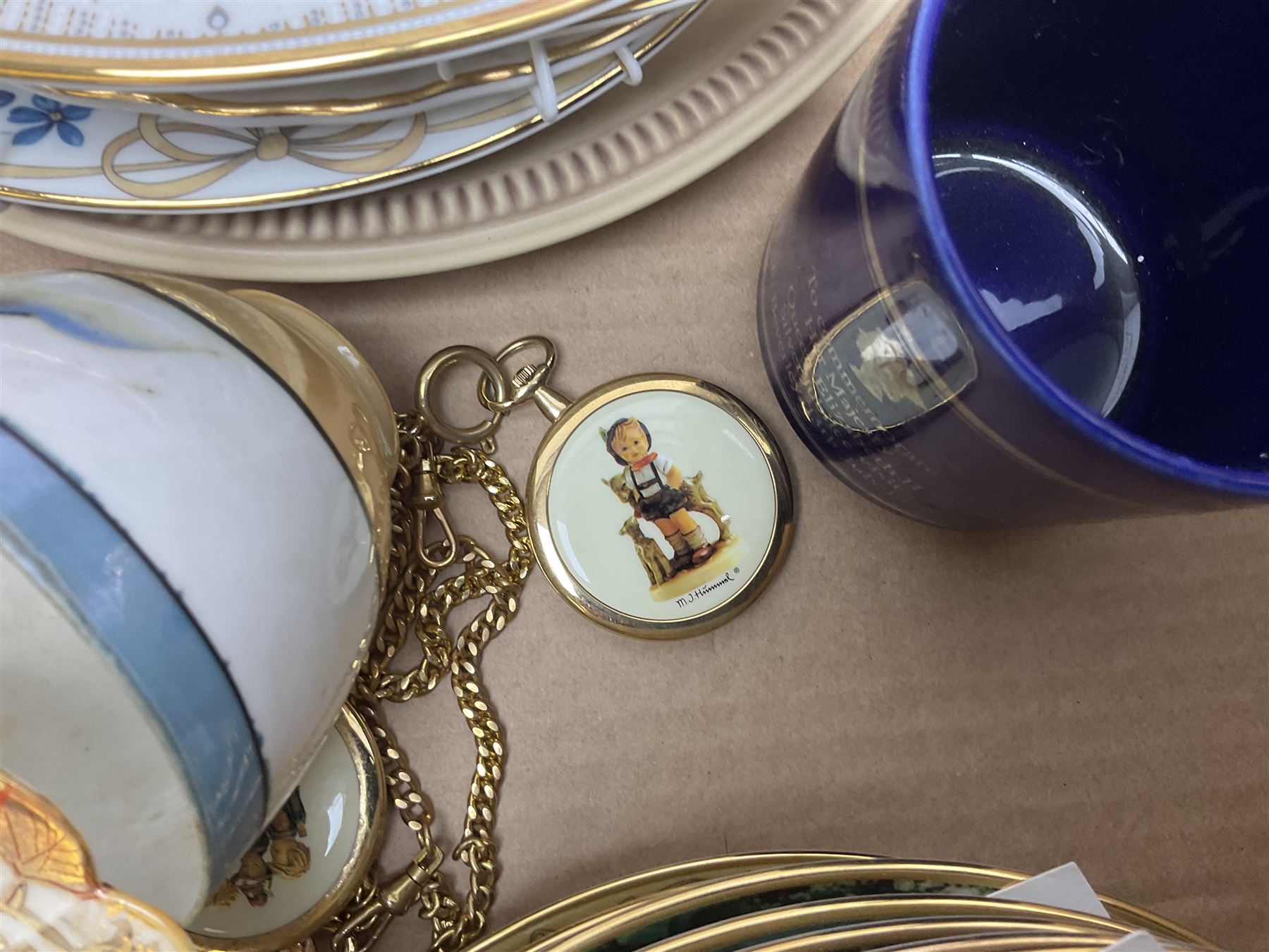 Twenty seven Porcelain Art miniature teapots, with wooden display together with a collection of other ceramics and glassware etc, including Goebel Hummel collectors plates, in three boxes,