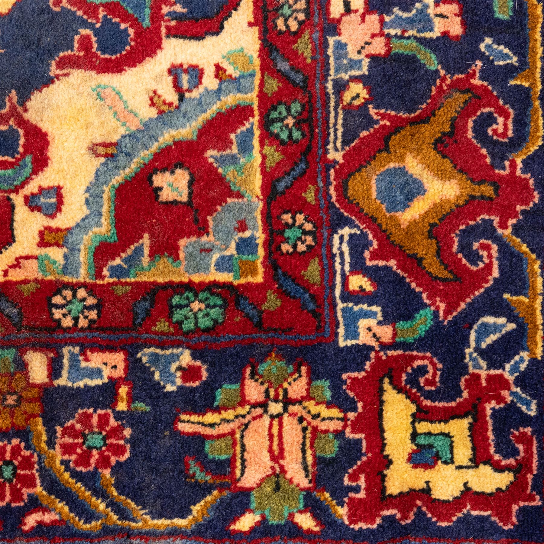 South West Persian Bidjar hand-knotted rug, olive and camel-toned field decorated with an all-over Herati lattice design with a central floral medallion within a wide floral border with shaped floral spandrels and multiple guard borders in tones of navy, ivory, crimson, and green, with cotton fringe ends  