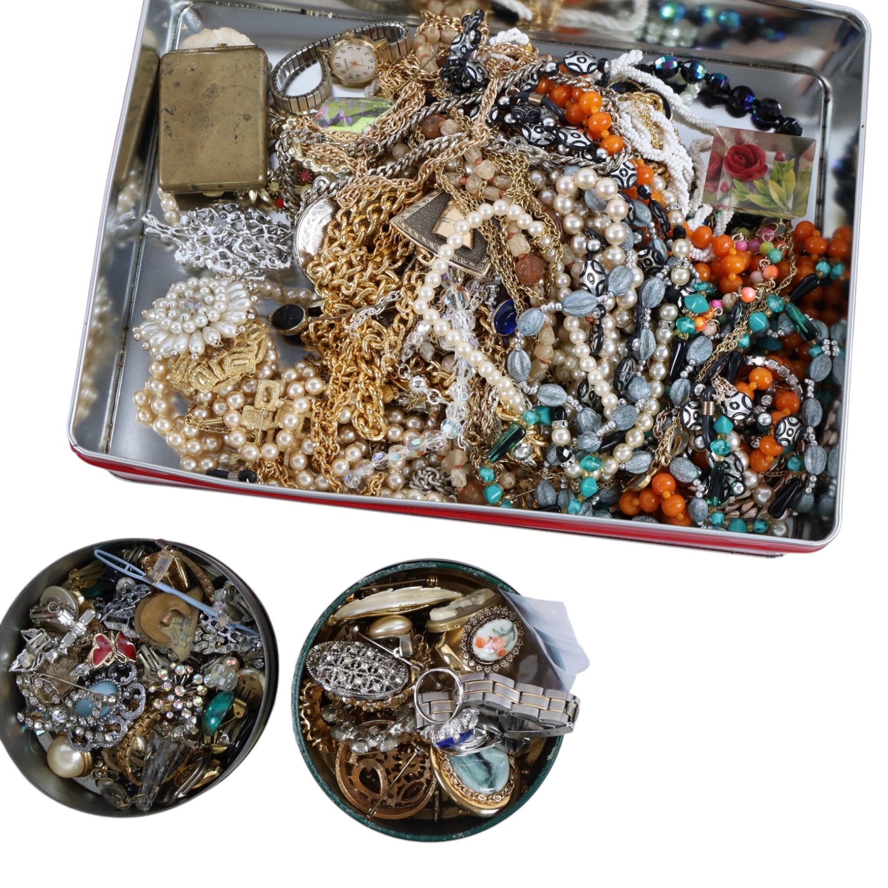 Collection of costume jewellery, including earrings, beaded necklaces brooches, etc, in various vintage tins