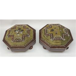 A pair of Victorian walnut and beadwork footstools, of octagonal form, raised upon four compressed bun feet, H11.5cm D30cm. 