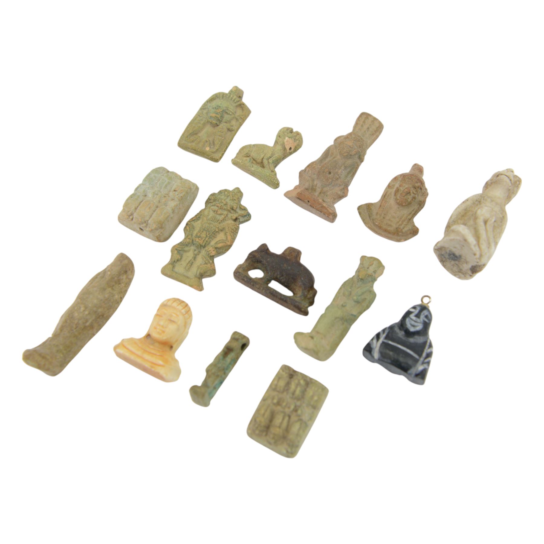 Collection of 20th century Egyptian tourist souvenir amulets and similar, including figures and zoomorphic examples 