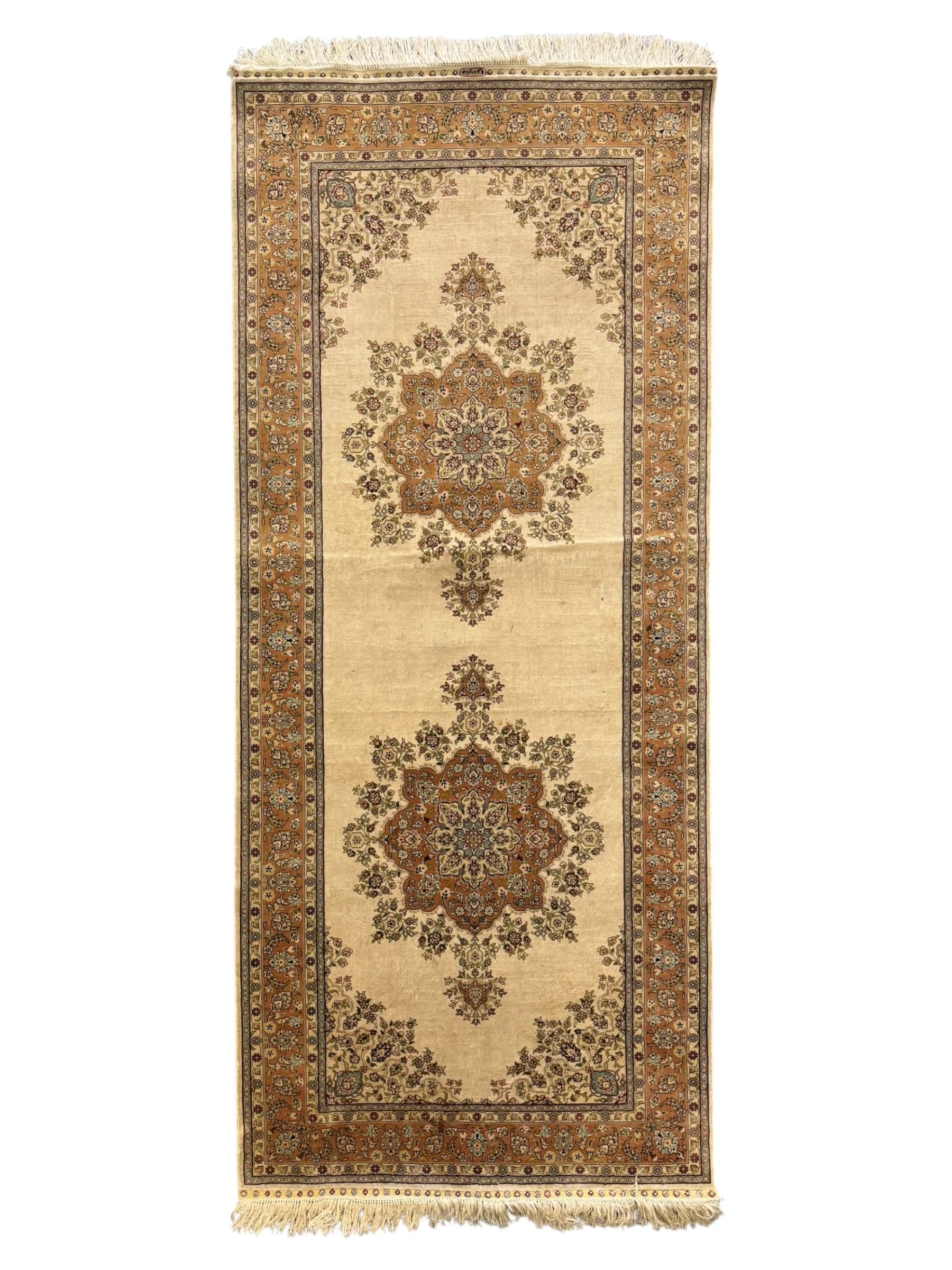 Finely knotted silk on silk ivory ground runner (L185cm,  W76cm), overall floral design together with a prayer rug (L94cm, W63cm)