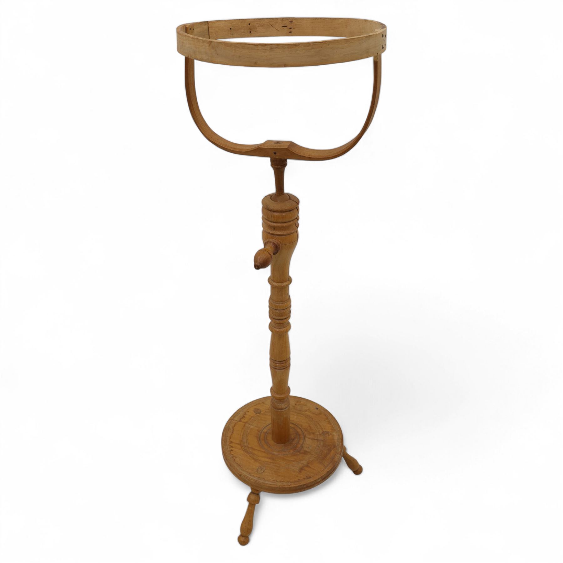 Mahogany torchiere H103cm, pine hat makers' stand H102cm, H91cm brass-bound planter on stand, brass standard lamp stand H127cm (4)