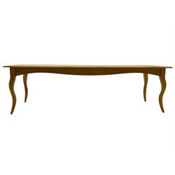 Light oak rectangular dining table, shaped cabriole supports