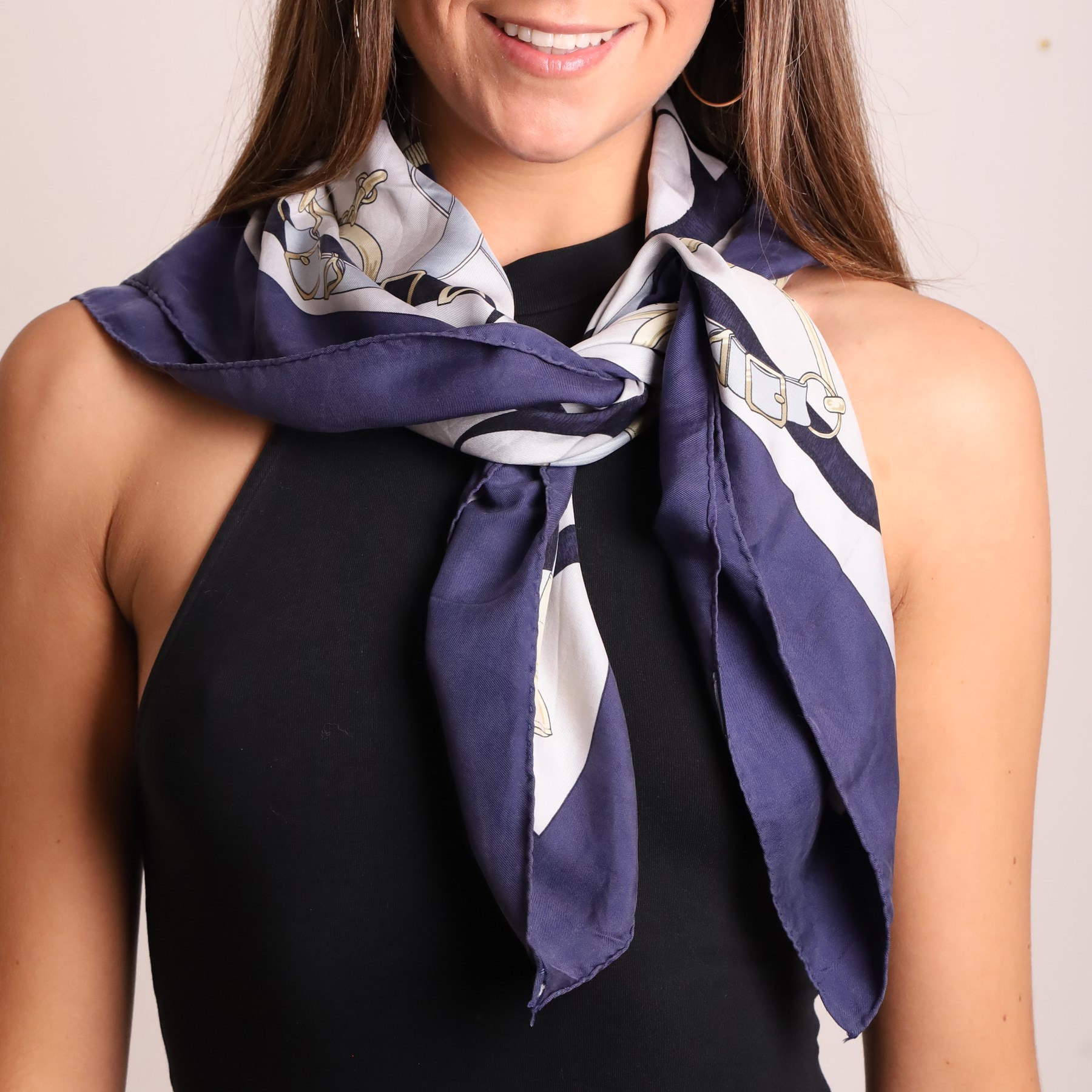 Hermès - ‘Éperon d’Or’ silk scarf, designed by Henri d’Origny, first issued 1974, navy, pale blue, ivory and gold colourway with hand-rolled edges
