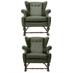 Pair mid 20th century wing back armchairs, upholstered in leather type fabric