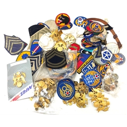  Large collection of American Air Force and Army cloth badges, including Ranger Airborne 5AF, rank stripes etc and a qty of similar cap badges buttons, etc   