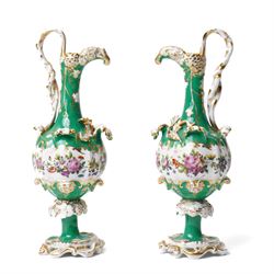 Pair of mid-19th century Jacob Petit ewers, in the Rococo Revival style, hand-painted with...