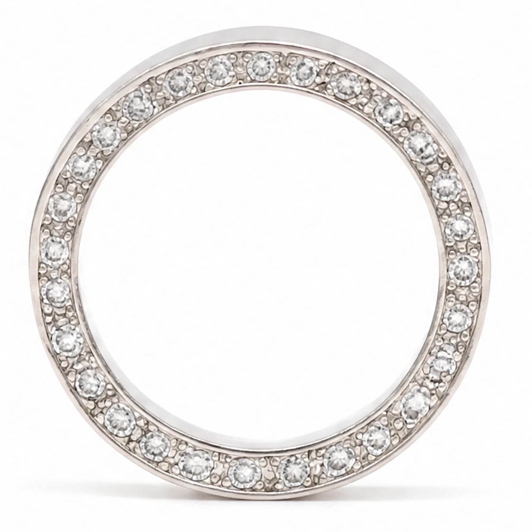 Platinum diamond wedding band, each side set with twenty-eight round brilliant cut diamonds, Sheffield 2000, total diamond weight approx 0.55 carat