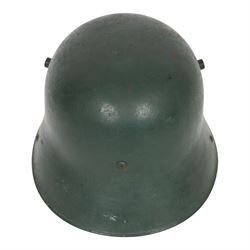 German double decal  M16 helmet with tricolour decal to the right and army eagle to the left, with leather lining and strap 