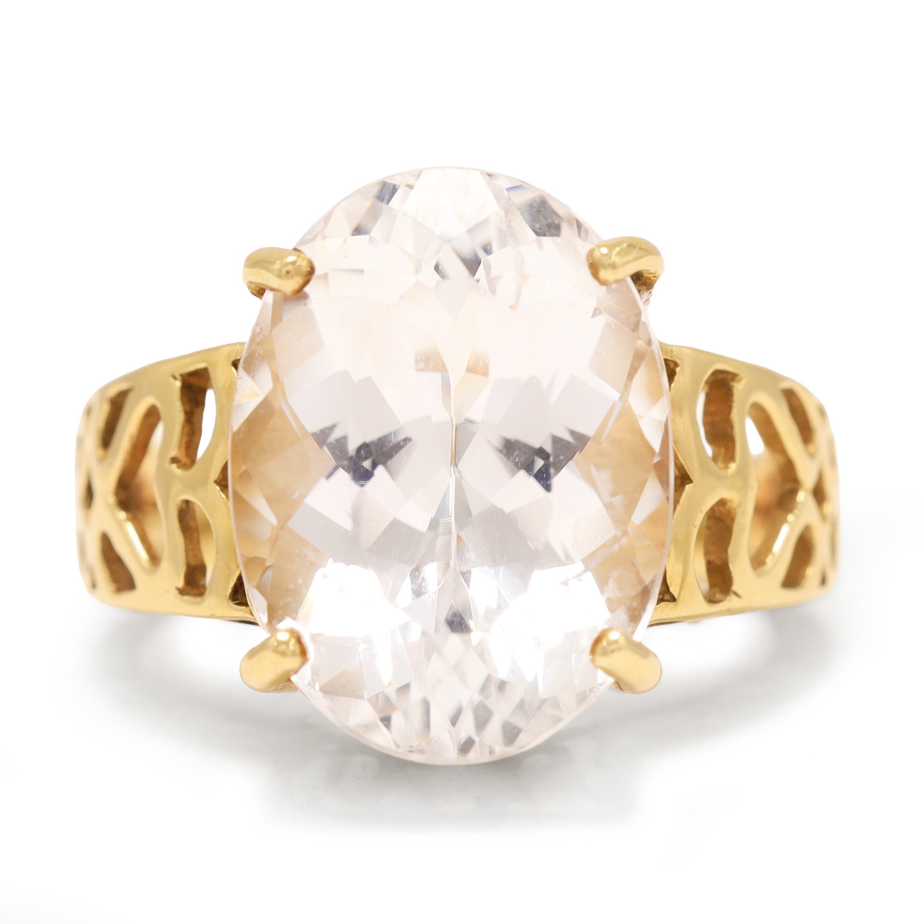 9ct gold kunzite ring, four claw set with a single oval cut kunzite, pierced design gallery and shoulders