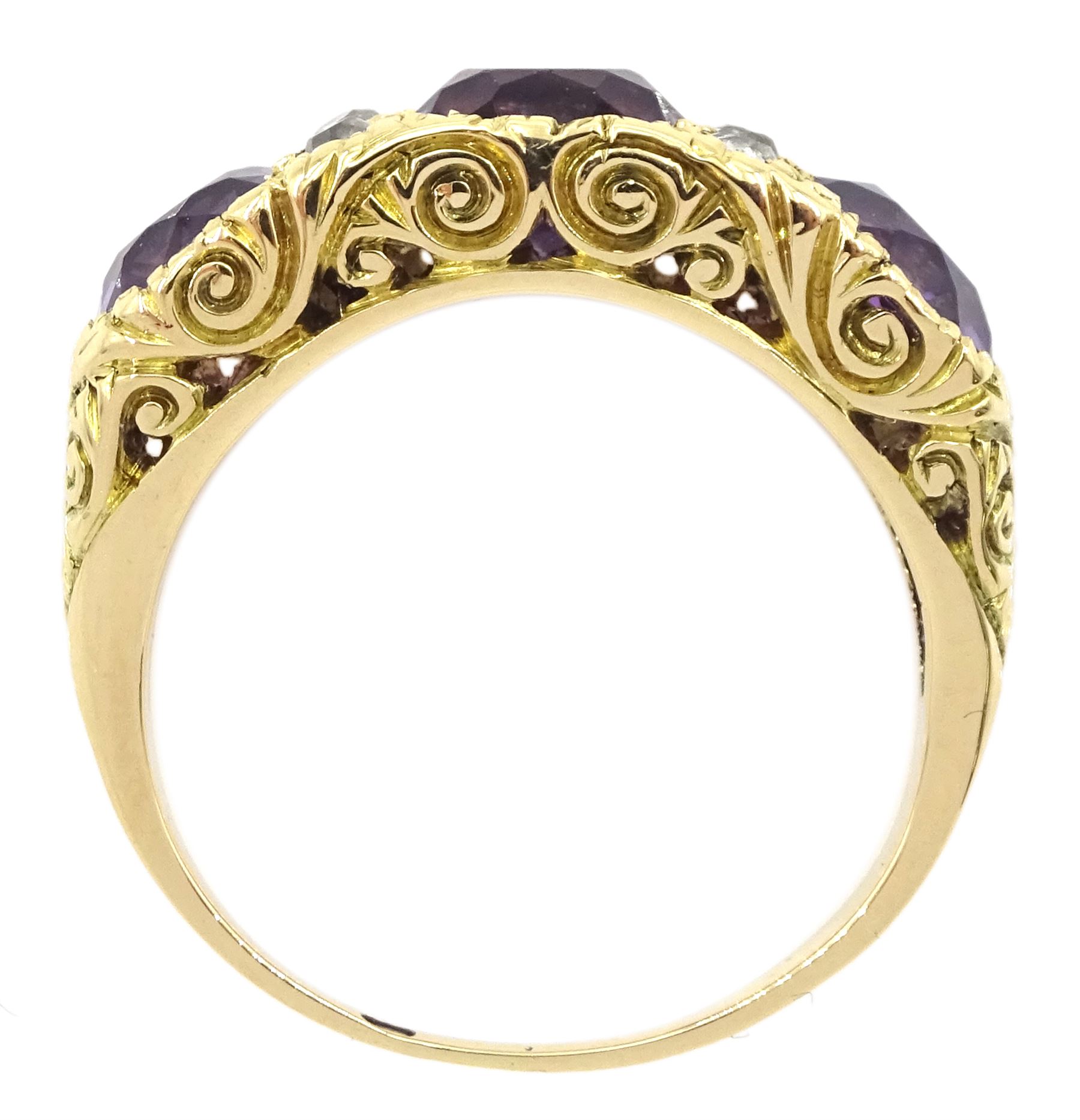 Dutch gold three stone round cut amethyst and six old cut diamond ring, stamped, total amethyst weight approx 3.95 carat