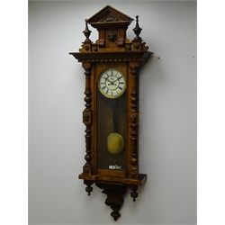  Victorian walnut Vienna style wall clock with architectural cresting, Roman dial with subsidiary, twin train movement striking on a coil, H142cm, with weights pendulum and key    