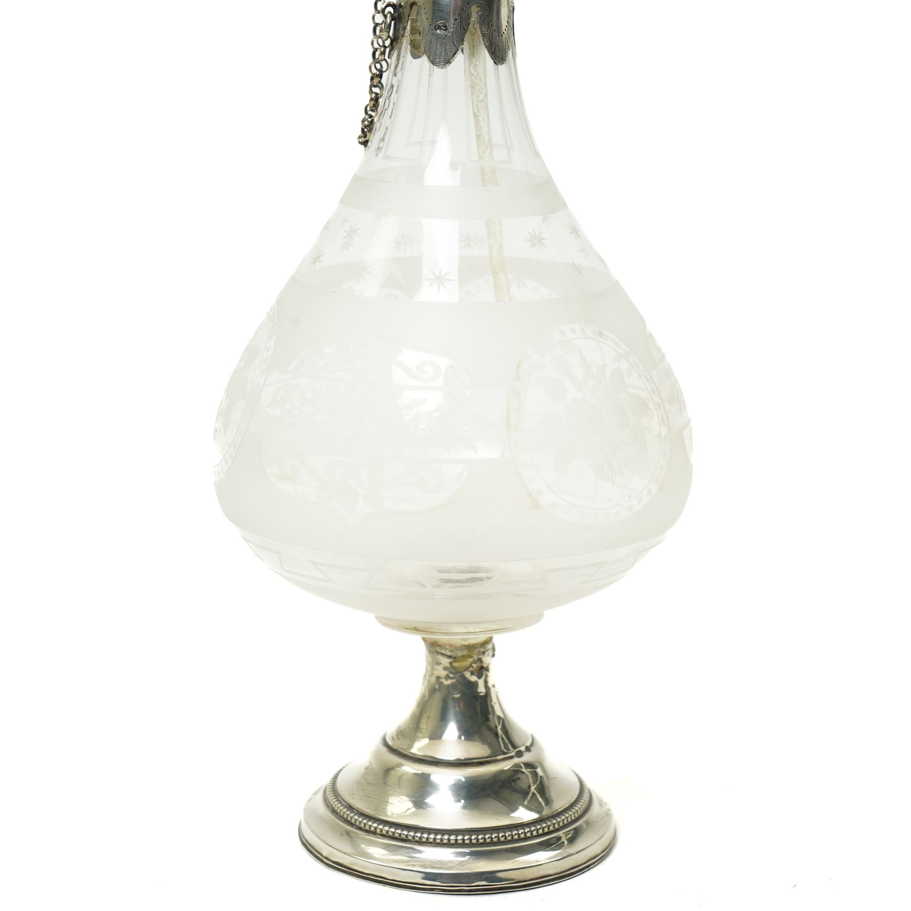 French glass decanter of baluster form with etched decoration and silver collar and foot H33cm