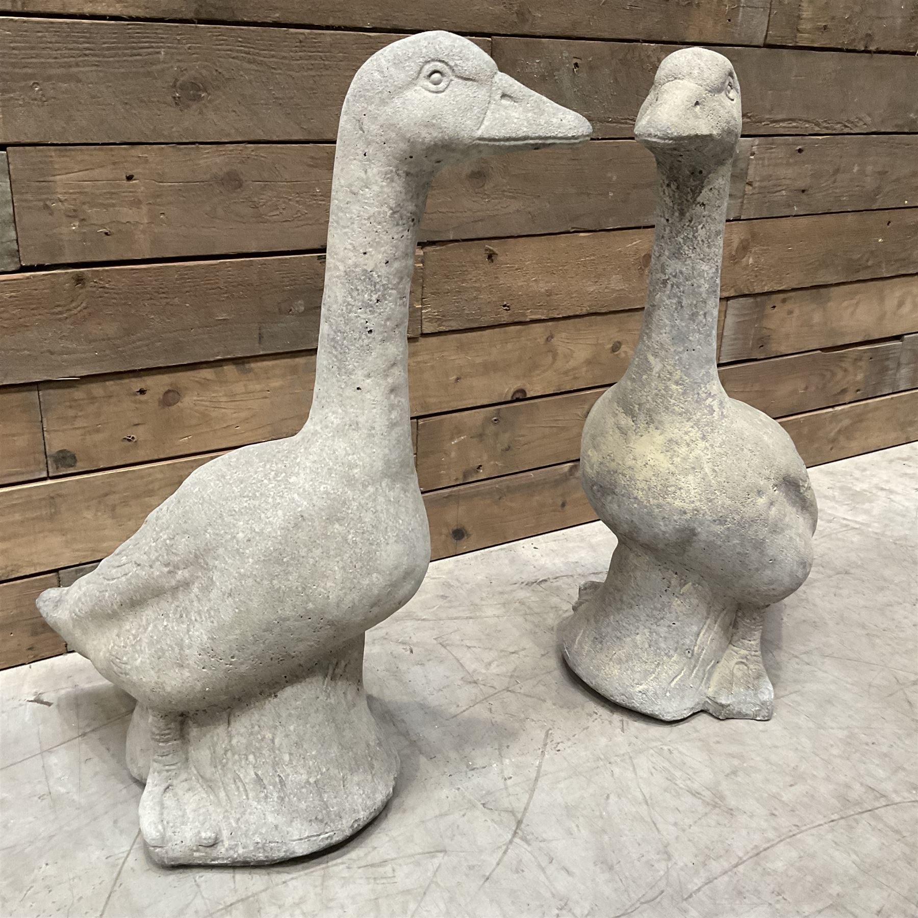Pair of cast stone garden geese