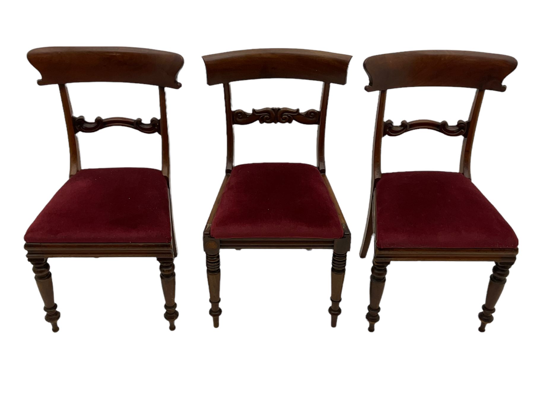 Seven early 19th century mahogany dining chairs - set six side chairs with scroll carved middle rails (W46cm), and a carver elbow chair with rope twist middle rail