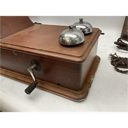 Mahogany cased wall telephone, marked N2516T to reverse and TEL Beeston Notts England to the side in gilt and black lettering, with Ericsson black Bakelite receiver, with hand crank and chrome bells, L39cm W22cm D21cm, together with a mahogany cased switchboard with copper fixtures and black buttons