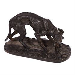 After R J Mene, bronze modelled as a dog with a bone, H5cm, L10cm 