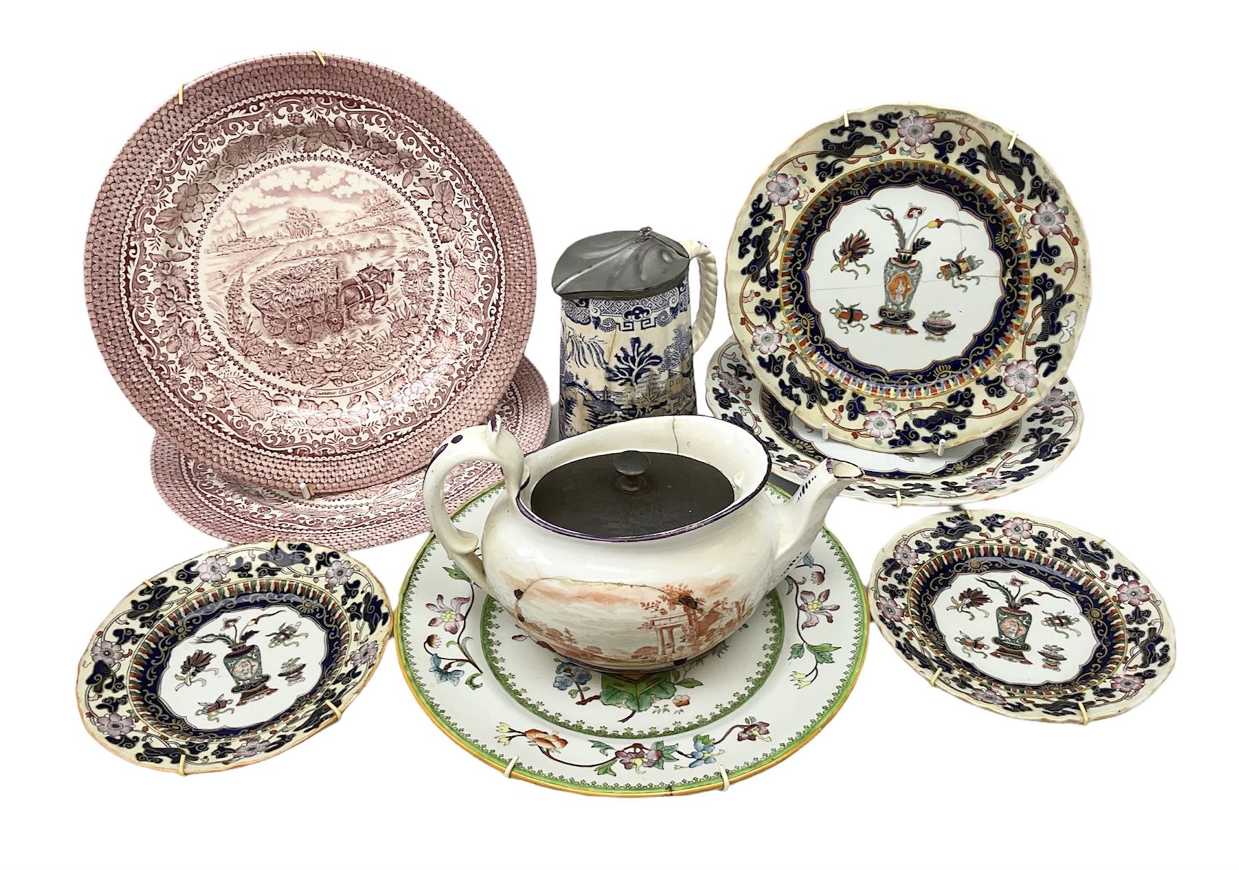 Four mid 19th century Mason's Ironstone plates decorated in the Chinese Antiquities pattern, the central circular panel decorated with footed vase with stylised motifs within a floral border, with gilt detail, pattern no. 1438, largest D26cm, together with Royal Worcester plate with floral decoration within green borders, blue and white tankard with pewter lid and teapot, teapot
